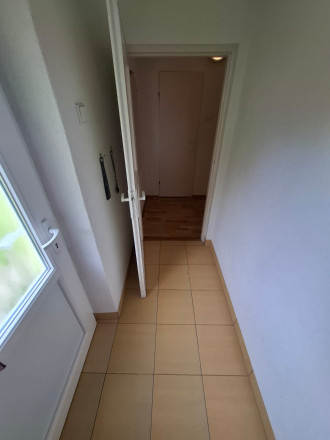 Útulný rodinný dom so záhradou v obci Rudňany - fotografia 21